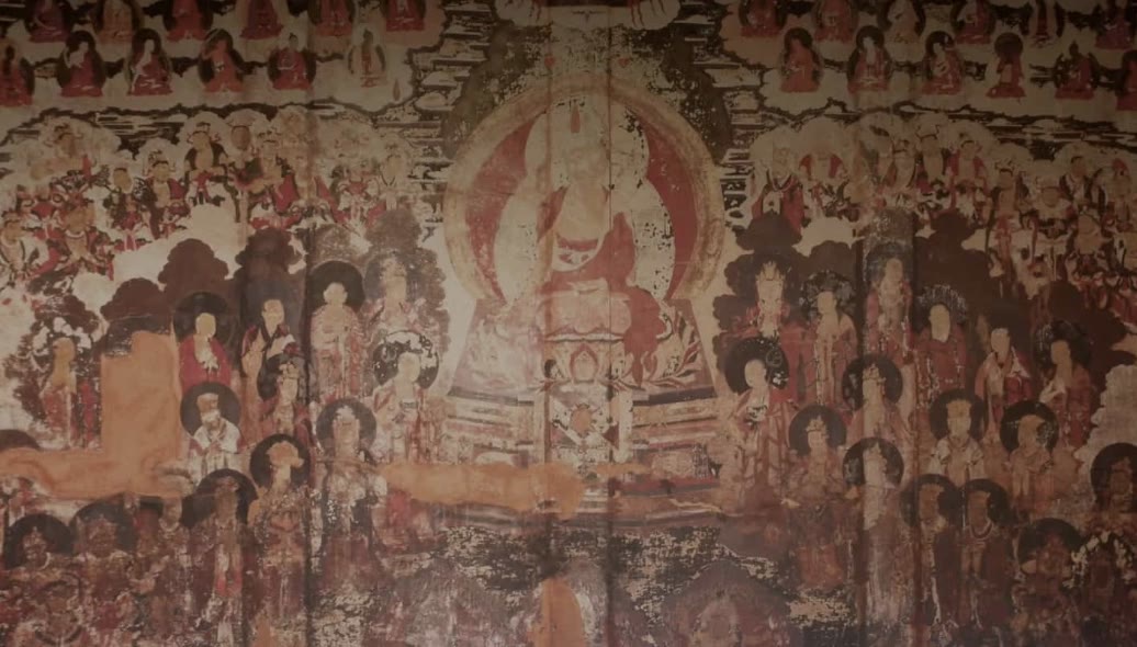 Boeddhistische, taoistische en Dongba-figuren naast elkaar op de Dabaoji-fresco's in Baisha